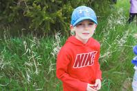 kinder boy smiling outside