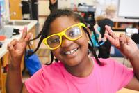 school age girl smiling