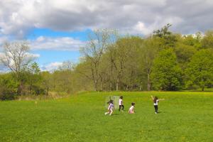 school age girls playing outside