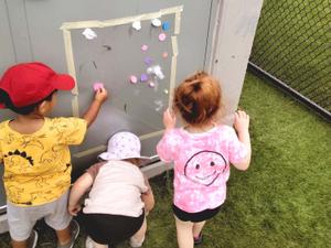 toddlers playing with sticky materials