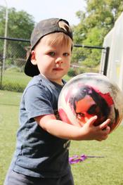 toddler child with ball