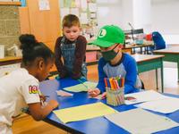 kinders drawing together