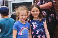 two kinder friends smiling together