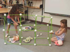 two children making a fort