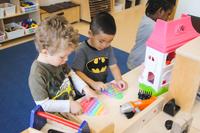 two preschool boys playing together