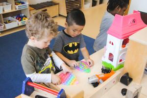 two preschool boys playing together