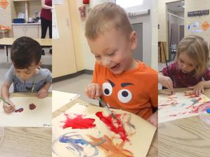 three children painting