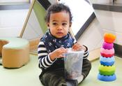 infant child in child care program