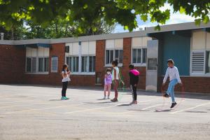 school age girls jumping rope