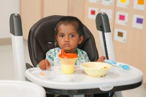 infant having lunch