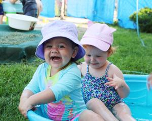 picture of toddler children in kiddie pool